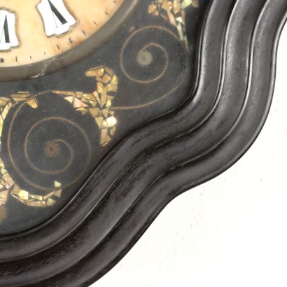 Horloge murale oeil de pendule