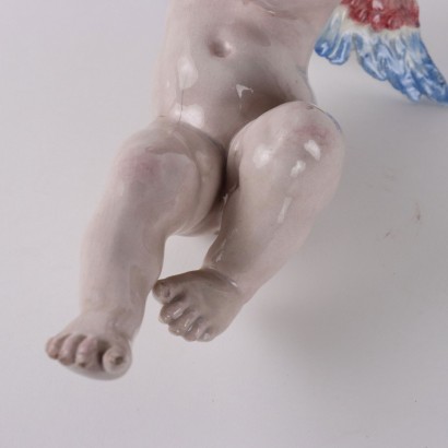 Putto en majolique