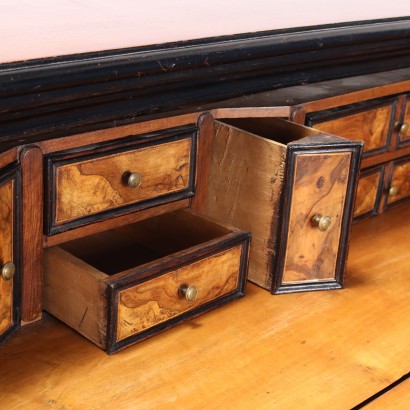 chest of drawers with a drop-leaf