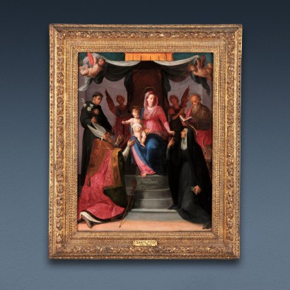 Madonna enthroned with Child between angels and saints