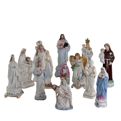 Grupo de 13 figuras religiosas en porcelana y galleta