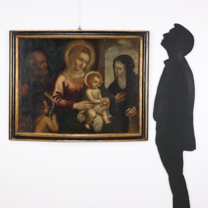 Peinture de la Sainte Famille avec des saints